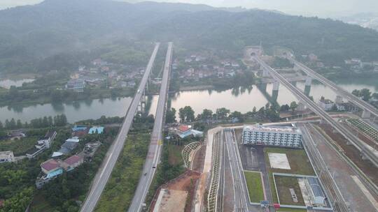 航拍高速路铁路穿山隧道