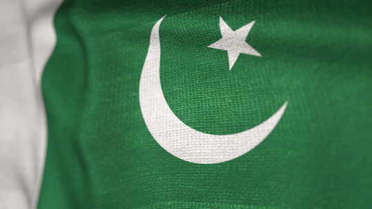 巴基斯坦波浪形旗帜在风中徐徐飘扬着五颜六