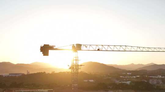 建筑工地航拍乡村建设农村开发吊塔日出工地