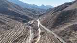 航拍山间蜿蜒公路高清在线视频素材下载
