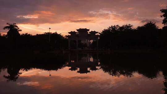 广州白云区陈田花园牌坊夕阳剪影倒影