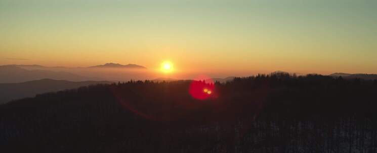 航拍山峰山脉夕阳日落西山晚霞唯美风景