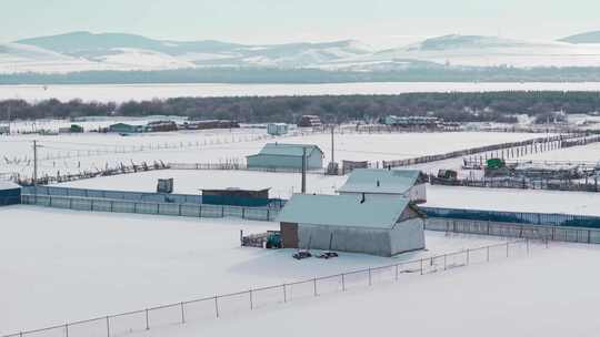 4K冬季呼伦贝尔雪原村庄航拍12