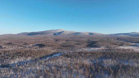 航拍大兴安岭冬季山川森林雪景