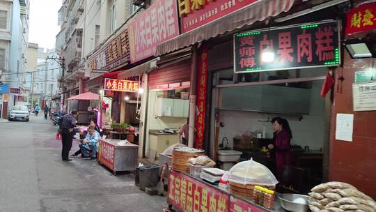 城市街道马路建筑步行街街商铺菜市场人流