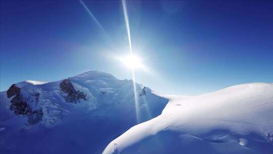 雪景雪山高原航拍FPV阳光照射雪山