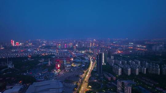 4K航拍黄昏下的湖南广电大楼三一大道