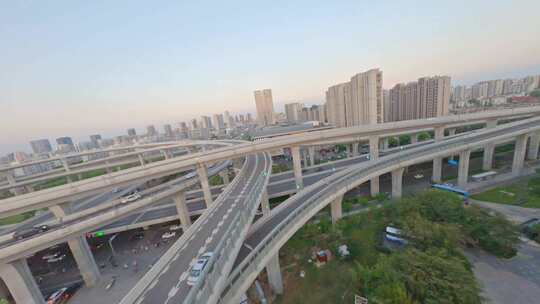 穿越机航拍扬州西区五层高架夕阳车流行驶