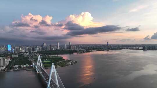 航拍海南海口海甸河世纪大桥滨海日落风光