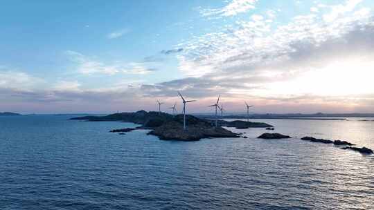 海上小岛日落日出风车航拍海岛海洋风力发电视频素材模板下载