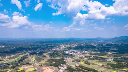 丘陵山川农田蓝天白云航拍延时8K