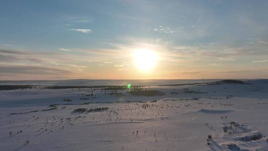 呼伦贝尔草原冬季落日雪景