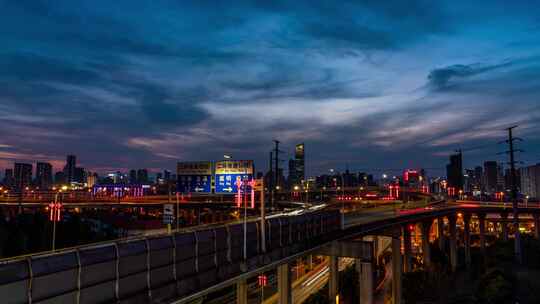 10K昆明CBD建筑交通夜景日转夜延时视频素材模板下载