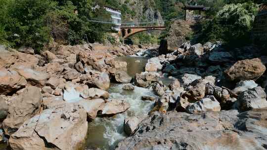 枯水期江河上游河床石头石桥视频素材模板下载
