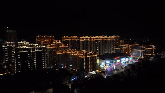 城镇小区广场夜景航拍城市夜景楼房住宅小区