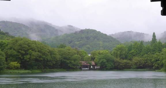 江南春天下雨杭州西湖泸晧湾空镜