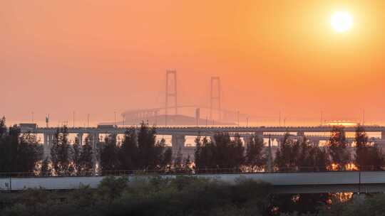 深中通道日落时分的跨海大桥远景延时