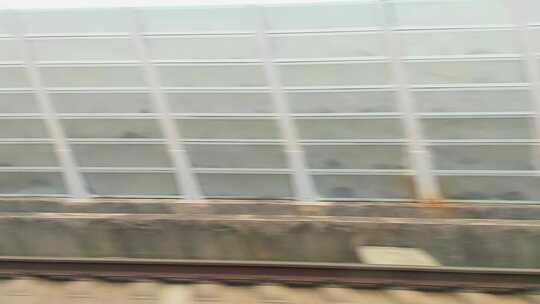 火车动车高铁行驶窗外的风景视频素材