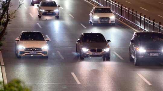 夜晚快速路隧道口车流马路行车亮化