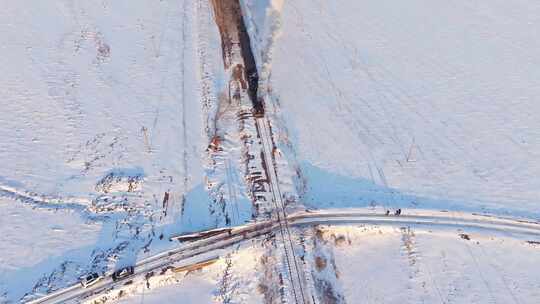 航拍中国东北冬季雪景中的蒸汽机车老火车