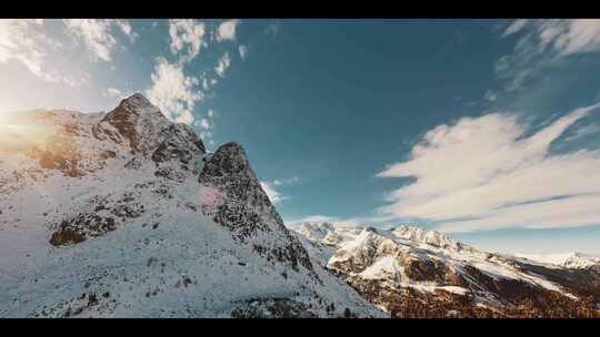 FPV无人机航拍雪山森林高山峡谷日出蓝天云