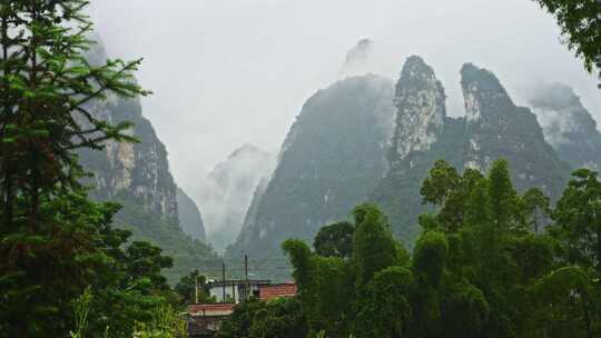 农村下雨雨景远山云雾雨季小雨