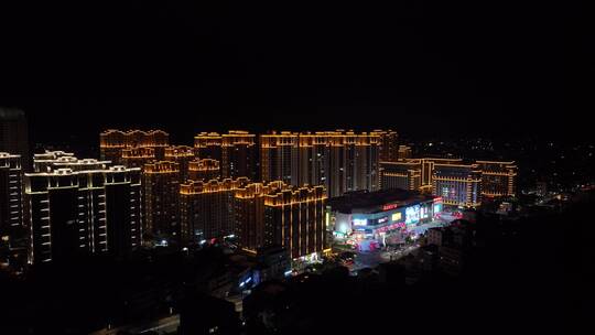 城镇小区广场夜景航拍城市夜景楼房住宅小区