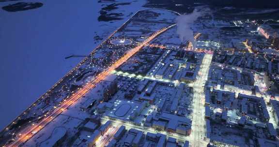 航拍雪后城市十字路口夜景