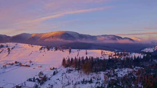 日落时分的雪山地貌航拍视频素材模板下载
