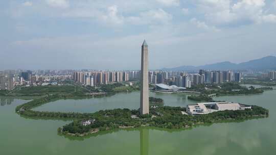 带高塔的水边城市景观九江胜利碑九江博物馆