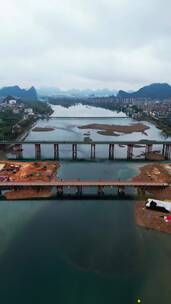 竖屏航拍桂林净瓶山大桥工地和试验水坝