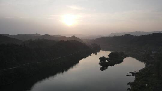 航拍大山河流日落夕阳剪影视频素材模板下载