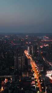 竖屏航拍四川乐山万家灯火城市夜景