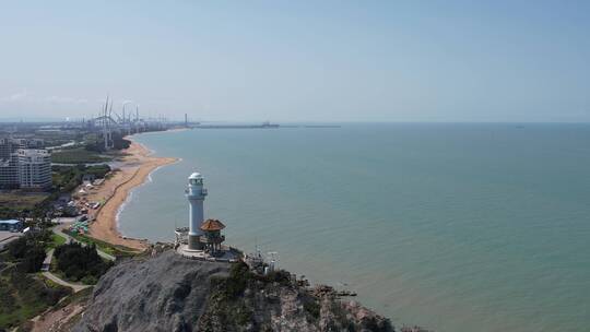 灯塔沙滩海洋海景房大风车