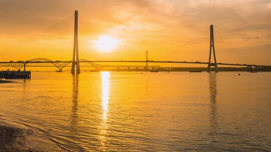 河流桥梁夕阳日落延时摄影