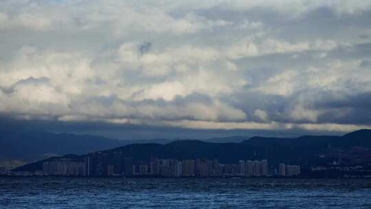 大理晚霞云端云朵彩云云彩城市建筑大厦高楼