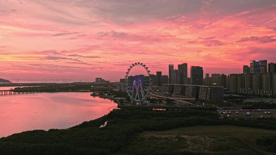 深圳宝安欢乐港湾湾区之光摩天轮晚霞左环绕