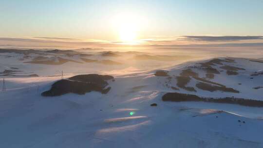 航拍雪域雪原夕阳