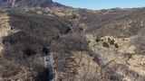 航拍蜿蜒盘旋的山间公路高清在线视频素材下载