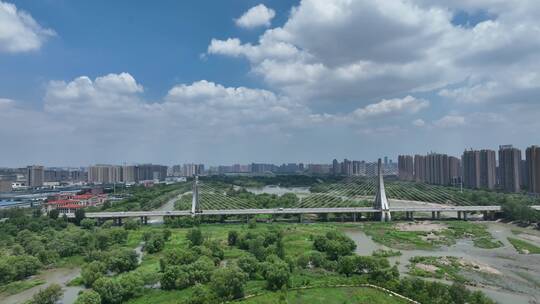 蓝天白云绿色生态城市桥梁河流交通