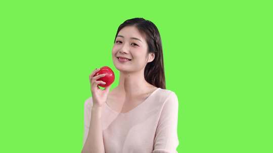 精品 · 手拿苹果的女生绿幕抠像视频