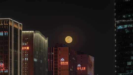 城市高楼与满月夜景 永康总部中心月升