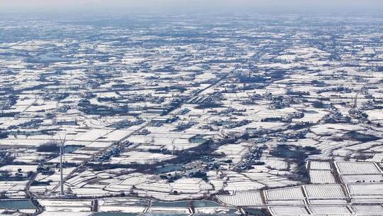 航拍乡镇雪景学校建筑田地大桥别墅河流房屋