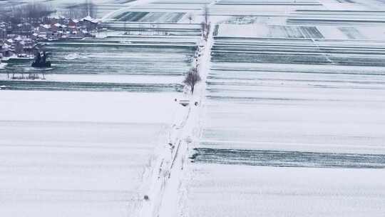 航拍冬天村庄雪景视频素材模板下载