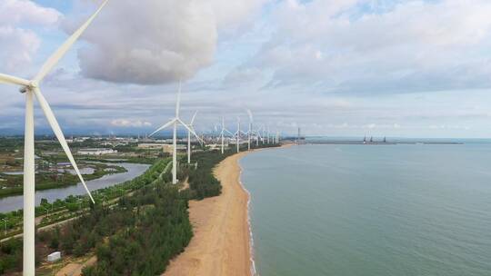 航拍中国海南海边的风车