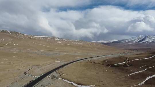 航拍新疆南疆帕米尔高原大气雪山公路景色视频素材模板下载