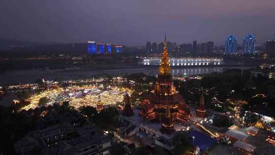 西双版纳景洪告庄星光夜市航拍城市夜景风光