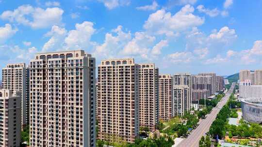 航拍蓝天白云下的枣庄双子星文体中心中心地标建筑