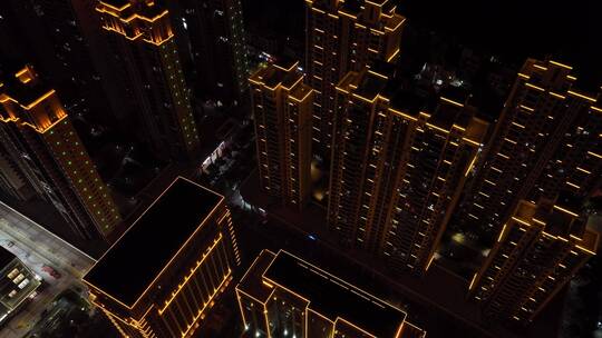 城镇小区广场夜景航拍城市夜景楼房住宅小区