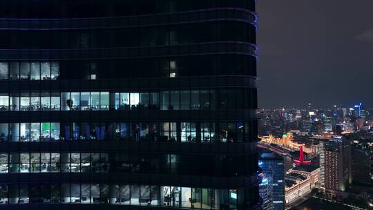 航拍上海商务楼白领加班忙碌夜景